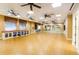 Spacious yoga studio with hardwood floors and mirrors at 4935 Marble Springs Cir, Wimauma, FL 33598