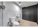 Small basement bathroom with toilet and sink at 5425 36Th N Ave, St Petersburg, FL 33710