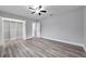 Bright bedroom with wood-look floors and spacious closet at 5425 36Th N Ave, St Petersburg, FL 33710