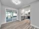 Bright dining area with sliding glass doors leading to a screened porch at 5425 36Th N Ave, St Petersburg, FL 33710