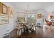 Bright dining area with hardwood floors and a chandelier at 5801 Leeland S St, St Petersburg, FL 33715