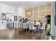 Bright dining room featuring a modern chandelier and wood flooring at 5801 Leeland S St, St Petersburg, FL 33715