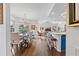 Elegant dining room with hardwood floors and view to the living room at 5801 Leeland S St, St Petersburg, FL 33715