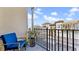 Private balcony overlooking the community with seating area at 614 105Th N Ln, St Petersburg, FL 33716