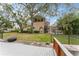 Large backyard with a canal view and boat dock at 660 Geneva Pl, Tampa, FL 33606