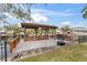 Covered boat dock with seating area on the water at 660 Geneva Pl, Tampa, FL 33606