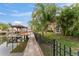 Waterfront property with private walkway and boat dock at 660 Geneva Pl, Tampa, FL 33606