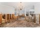 Renovation project: Dining room with chandelier and columns at 660 Geneva Pl, Tampa, FL 33606