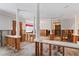 Dining room in the midst of a renovation; significant damage is visible at 660 Geneva Pl, Tampa, FL 33606