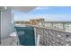 Spacious balcony with patio furniture and water views at 7 Elgin Pl # 512, Dunedin, FL 34698