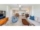 Bright living room features stylish furniture, a coffee table, and hardwood floors at 7 Elgin Pl # 512, Dunedin, FL 34698