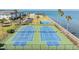 Two well-maintained tennis courts with water views at 7 Elgin Pl # 512, Dunedin, FL 34698