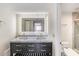 Elegant bathroom with double vanity and marble at 7 Elgin Pl # 701, Dunedin, FL 34698