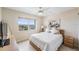 Spacious bedroom with ocean view and ceiling fan at 7 Elgin Pl # 701, Dunedin, FL 34698