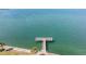 Private fishing pier extending over water at 7 Elgin Pl # 701, Dunedin, FL 34698