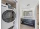 Convenient laundry room with washer and dryer at 7 Elgin Pl # 701, Dunedin, FL 34698