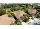 Bird's-eye view of houses with brown roofs and palm trees at 7402 Hamilton Rd, Bradenton, FL 34209