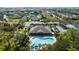 Aerial view showing community pool, clubhouse, and neighborhood at 7402 Hamilton Rd, Bradenton, FL 34209