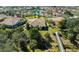 Aerial view showing home and community with lush landscaping at 7402 Hamilton Rd, Bradenton, FL 34209