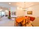 Elegant dining room featuring a wood table and access to the living room at 7402 Hamilton Rd, Bradenton, FL 34209