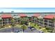 Condo building showcasing waterfront views and parking at 868 Bayway Blvd # 312, Clearwater Beach, FL 33767