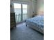 Main bedroom with king bed and water views at 868 Bayway Blvd # 312, Clearwater Beach, FL 33767