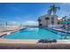 Sparkling pool with alligator statue and waterfront view at 868 Bayway Blvd # 312, Clearwater Beach, FL 33767