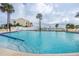 Circular pool with steps and lounge chairs at 868 Bayway Blvd # 312, Clearwater Beach, FL 33767