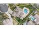 Aerial view showcasing a single-Gathering home with a pool at 9203 Sea Oaks Ct, Seminole, FL 33776