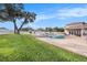 Expansive backyard with lush lawn and pool area at 9203 Sea Oaks Ct, Seminole, FL 33776