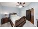 Bright bedroom featuring a double bed and ceiling fan at 9203 Sea Oaks Ct, Seminole, FL 33776