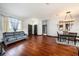 Elegant dining room with hardwood floors and chandelier at 9203 Sea Oaks Ct, Seminole, FL 33776