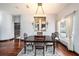 Formal dining room with hardwood floors and chandelier at 9203 Sea Oaks Ct, Seminole, FL 33776