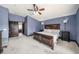 Serene main bedroom with plush carpeting and private bathroom access at 9203 Sea Oaks Ct, Seminole, FL 33776