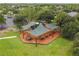 Aerial view of a playground with shade structures at 9846 Red Bay Loop, Land O Lakes, FL 34637