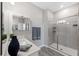 Clean bathroom with a frameless glass shower and modern fixtures at 9846 Red Bay Loop, Land O Lakes, FL 34637