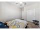 Bedroom featuring a ceiling fan and carpet flooring at 9846 Red Bay Loop, Land O Lakes, FL 34637