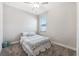 Bright bedroom with carpeted floor, window, and ceiling fan at 9846 Red Bay Loop, Land O Lakes, FL 34637