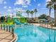 Bright turquoise pool with ' water features at 9846 Red Bay Loop, Land O Lakes, FL 34637