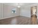 Bright dining room with hardwood floors and chandelier at 9846 Red Bay Loop, Land O Lakes, FL 34637