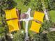 Aerial view of playground with yellow shade sails at 9846 Red Bay Loop, Land O Lakes, FL 34637