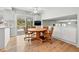 Kitchen breakfast nook with a round table and four chairs at 1 Gallinule Pl, Belleair, FL 33756