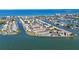 Expansive aerial view of waterfront community at 1 Windrush Blvd # 100, Indian Rocks Beach, FL 33785