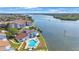 Community features waterfront access and a pool at 1 Windrush Blvd # 100, Indian Rocks Beach, FL 33785