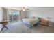 Spacious bedroom with water view and ample natural light at 1 Windrush Blvd # 100, Indian Rocks Beach, FL 33785