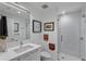 Clean bathroom with a walk-in shower and modern vanity at 100 1St N Ave # 503, St Petersburg, FL 33701