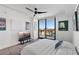 Bright bedroom with balcony access and city views at 100 1St N Ave # 503, St Petersburg, FL 33701