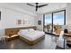 Modern bedroom with balcony access and city views at 100 1St N Ave # 503, St Petersburg, FL 33701