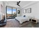 Modern bedroom with city views and a ceiling fan at 100 1St N Ave # 503, St Petersburg, FL 33701