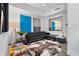 Sophisticated living room featuring a leather sectional and large mirror at 100 1St N Ave # 503, St Petersburg, FL 33701